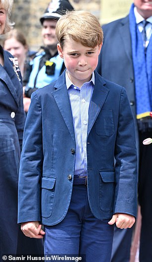 George looked sweet in a navy blue jacket.