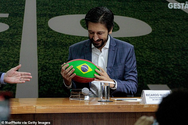 Sao Paulo Mayor Ricardo Nunes holds a football on August 10 in Brazil