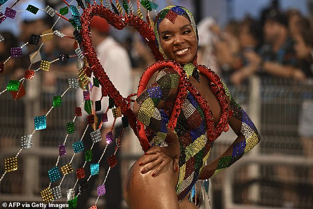 A reveler from the Mocidade Alegre samba school performs during the second night of carnival