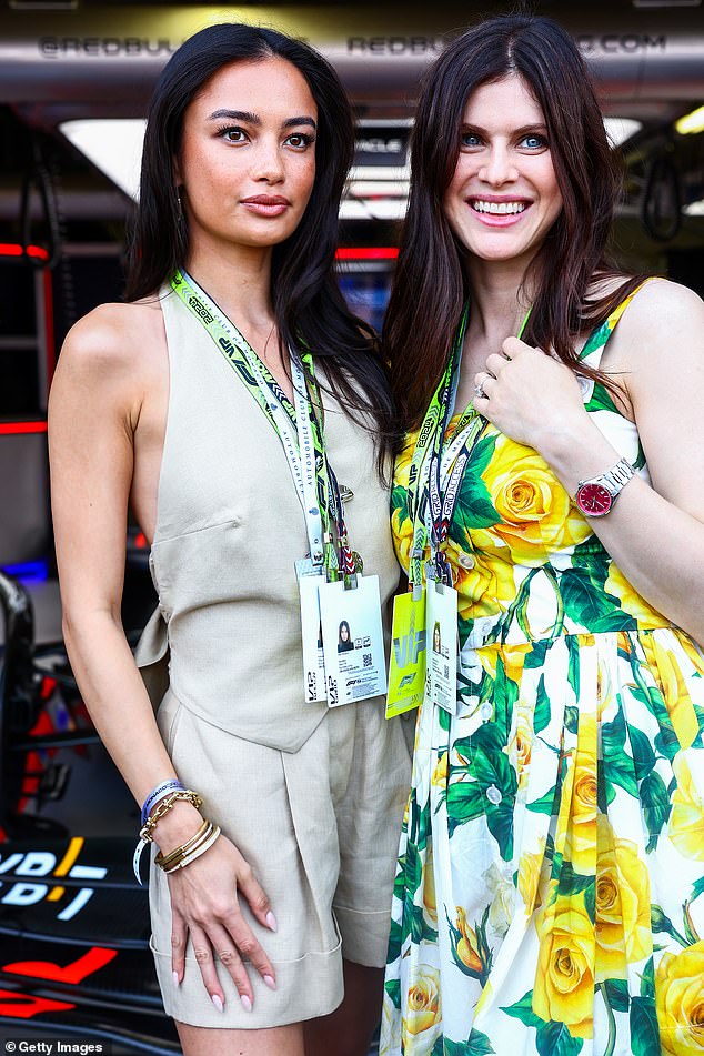 With her brunette tresses long and loose, the stunning actress posed with Sports Illustrated swimsuit model Kelsey Merritt.