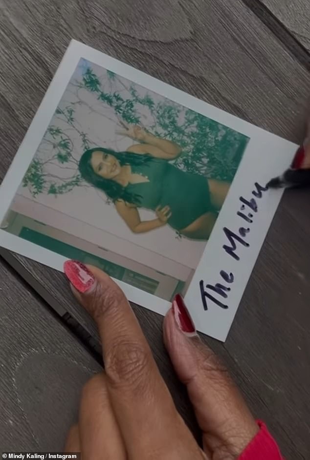 Kaling also filmed herself admiring and tagging a photo of herself wearing 'The Malibu,' which was a sexy dark-colored bodysuit with buttons that she left undone to achieve a deep, low-cut neckline.