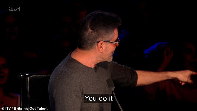 It was at this point that Simon asked the audience if anyone thought Haribow deserved the golden buzzer, prompting more roars, before leaving Eric and Hollie to do the honours.