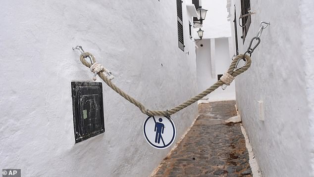 Angry locals have put up rope and chain no trespassing signs around the town in a bid to deter visitors.