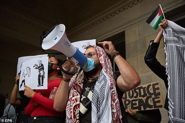 Pro-Palestinian protesters chant as they occupy Dodd Hall at the University of California, Los Angeles (UCLA) in Los Angeles earlier this month.