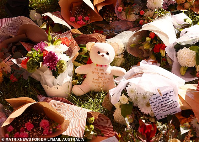 Loved ones of those killed in the bus crash are worried that Button will spend only a few years in jail for killing 10 and injuring 25 other passengers (pictured, makeshift memorial for victims after the crash).