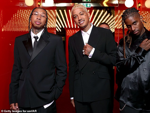 After Akiva introduced Tyga and Edward, he also allegedly yelled at Travis, which appears to have upset the Sicko Mode rapper; Tyga (far left) and Edwards (center) seen in Cannes on Thursday