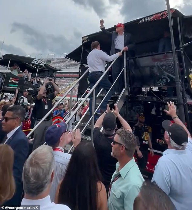 Trump was later seen causing great excitement as he walked around the track's infield and pit lane.