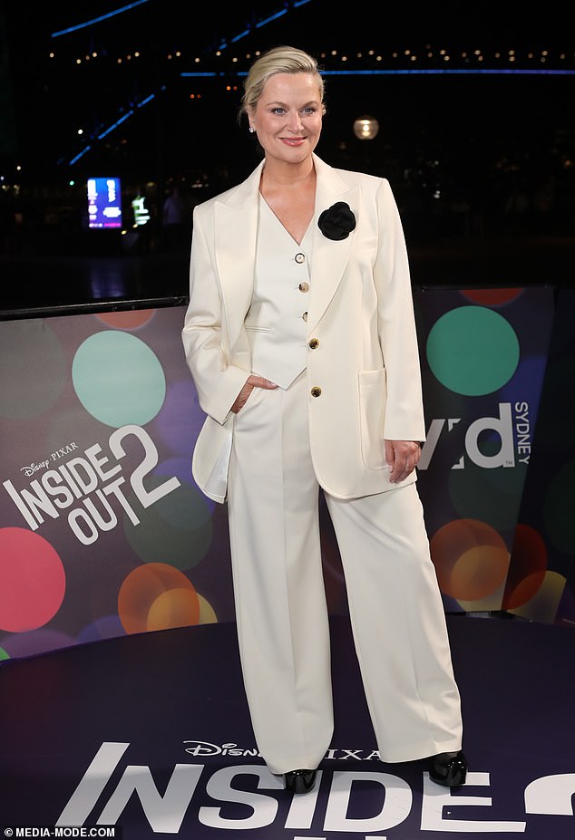 The former Saturday Night Live star, who plays Joy in the children's film, opted for a cream three-piece suit