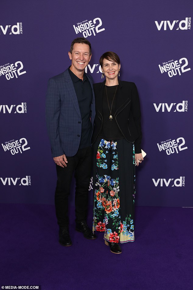 Channel 10 star Rove McManus opted for a sleek suit, while his wife, actress Tasma Walton, opted for a boho chic look in a velvet jacket and floral maxi dress. Both in the photo