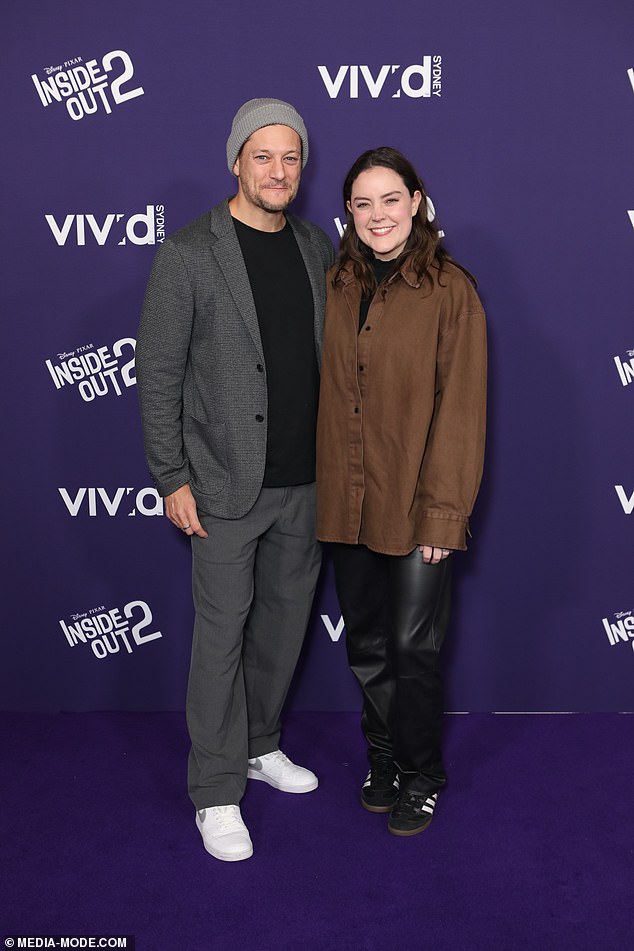 Singer Rob Mills and his The Project star fiancée Georgie Tunny went on a date night and each dressed in casual, cozy outfits for the film screening. Both in the photo