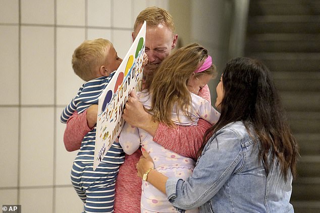 A video captured the touching moment when Hagerich, 39, arrived at the airport and immediately hugged his children and wife, seeing them for the first time since his arrest.