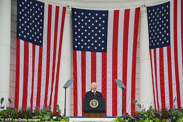 Biden reflected on the loss of his own son Beau while delivering remarks honoring military members in Arlington Auditorium.