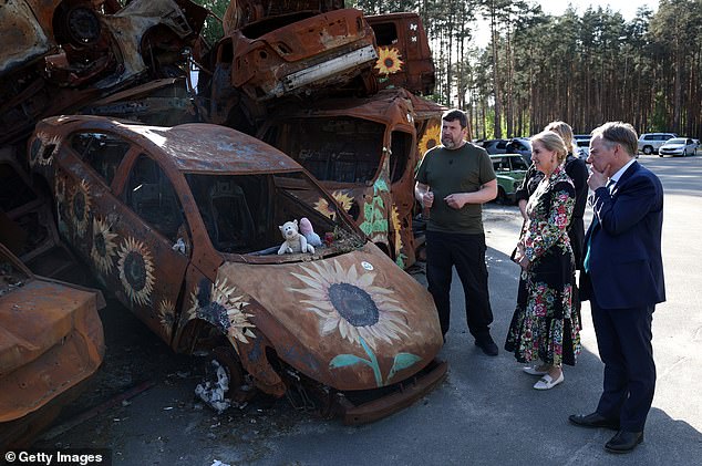 Sophie, 59, last month became the first member of the royal family to visit the country since the Russian invasion in February 2022. She and the UK ambassador to Ukraine, Martin Harris, are pictured visiting the car cemetery on April 29, 2024 in Irpin. , Ukraine