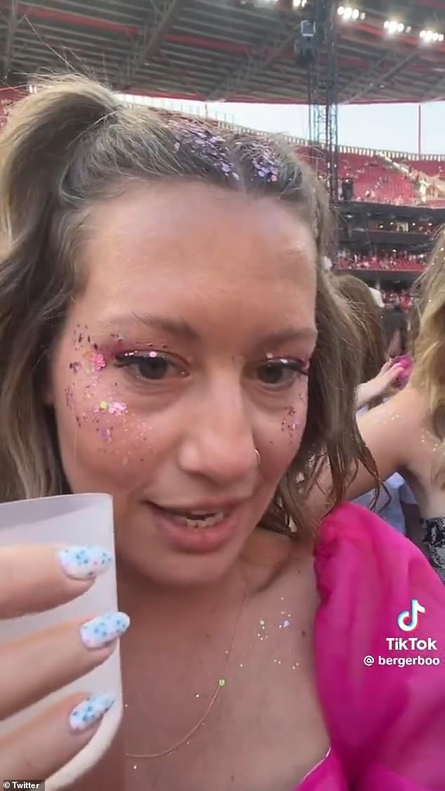 Berger showed off her view from the ground level of the concert at the Estádio da Luz stadium in Portugal as she held a drink in her hand and told the fans around her 