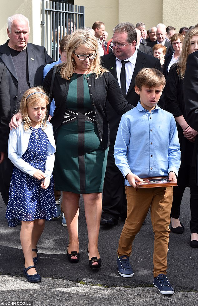 Jack and Sarah Corbett were seen being comforted by their aunt Tracey Lynch at their father's funeral in 2015.