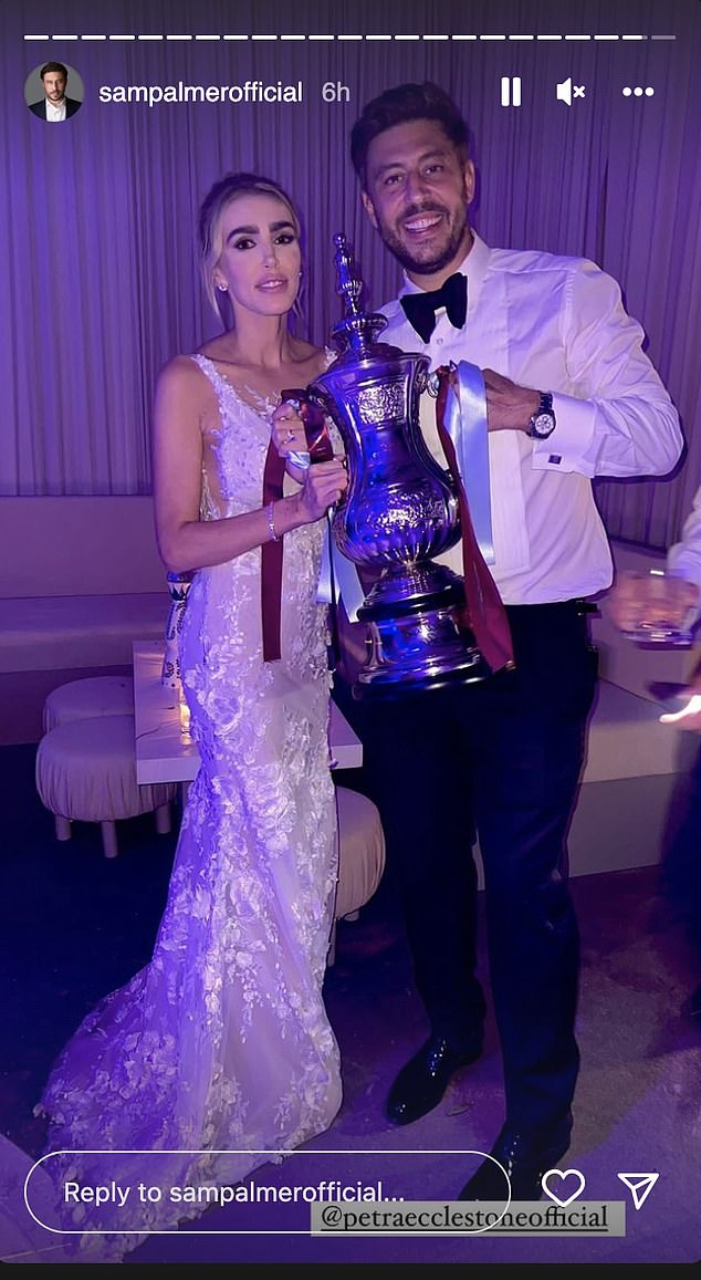 The couple at their lavish wedding ceremony on July 16, 2022. Sam received the 1980 FA Cup as a gift, with the trophy won by West Ham after beating Arsenal by a single goal.