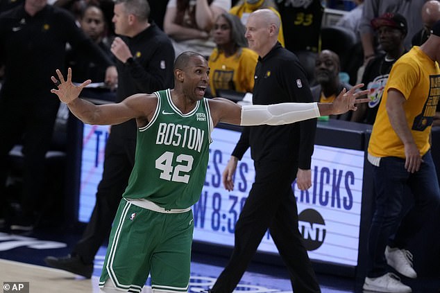 Al Horford is seen celebrating the victory as the final buzzer of the game sounds Monday night.