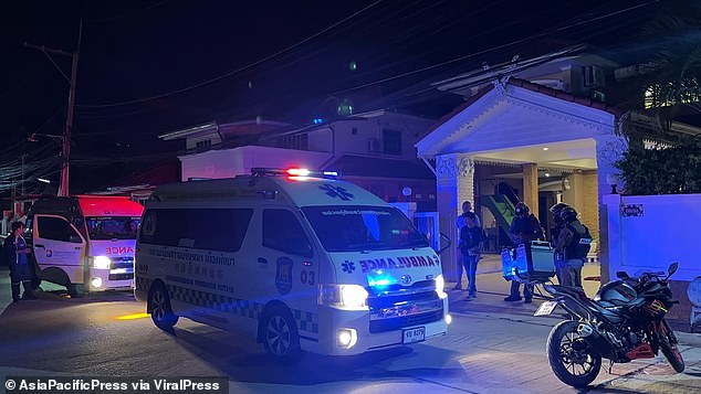 In the photo, an ambulance is seen waiting outside the scene of the attack.