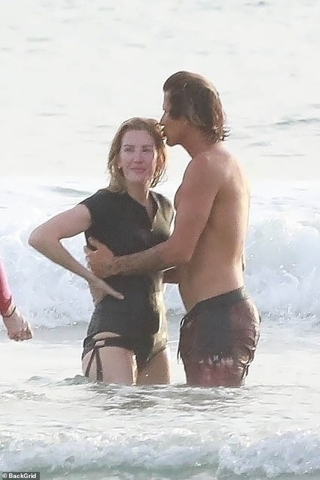 Photos taken in February showing Ellie frolicking in the sea with Armando without her wedding ring only fueled speculation that she and her husband had been living apart for six months.