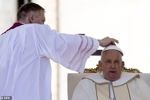 The Pope was photographed today (right) at a World Children's Day event in Rome.