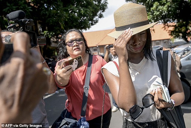 Mr Smith's wife Tracy Ijusa (pictured) is seen being prevented from seeing her husband on May 13.