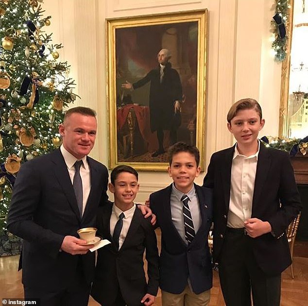 Rooney, pictured in 2018, was asked to give soccer lessons to Trump's son Barron (right).