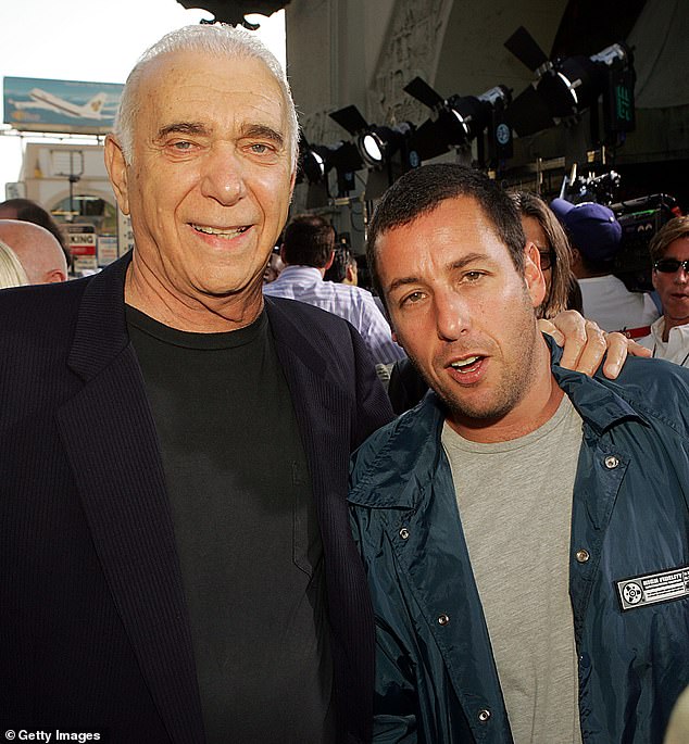 The producer seen with Adam Sandler at the premiere of the film The Longest Yard in 2005 in Los Angeles.