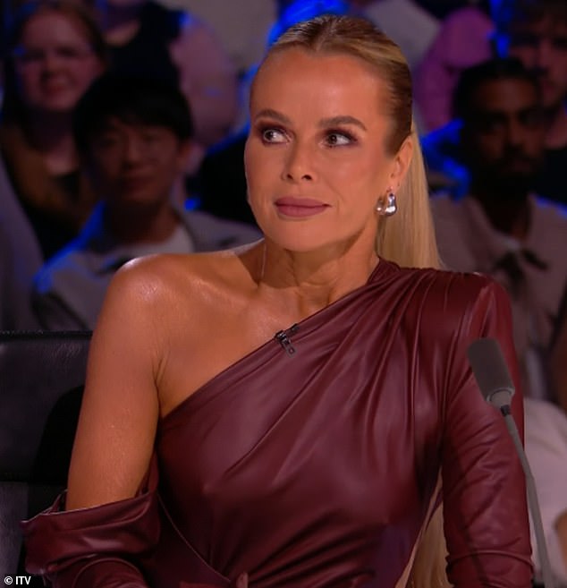 During Monday's first live semi-final, Amanda caught the attention of Britain's Got Talent viewers while wearing a revealing burgundy red dress.