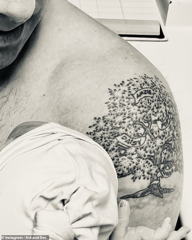 Ant shared an Instagram snap sweetly cradling his baby boy and writing: 'Born 14/05/24 at 8:54am. The baby is beautiful, mom is a legend, the sisters are delighted. Dad is a disaster!