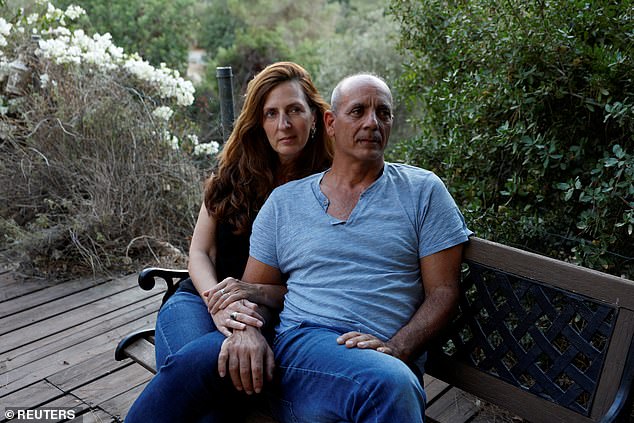 Nissim and Ricarda Louk, the parents of Shani Louk, 22, who was taken hostage by Hamas after being kidnapped at the Nova festival, following a deadly infiltration by Hamas gunmen from the Gaza Strip in Israel, and who more He was later confirmed dead by the Israeli government. , are photographed at his home in Srigim-Li On, Israel