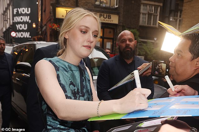 The blonde beauty was also seen greeting her fans outside the star-studded event as she stopped to sign signs and pose for some photos.