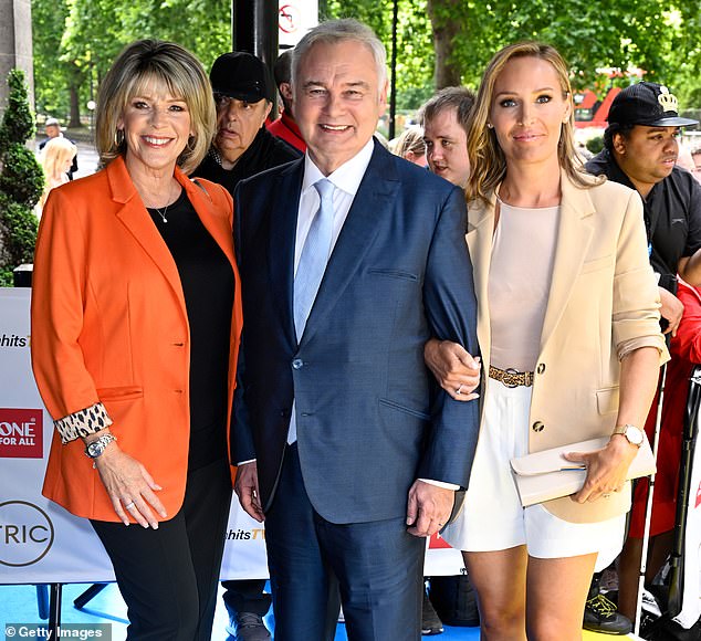 Holmes pictured with Ms Langsford (left) and Ms Webster (right) at the TRIC Awards in London in 2022. Alongside her co-presenter Ms Webster, the broadcaster, 64, said: 