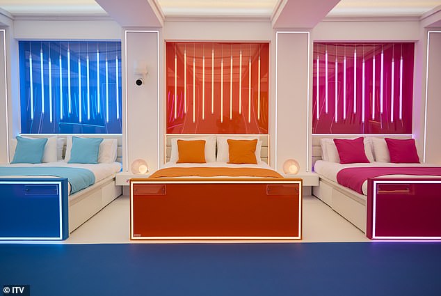 Colorful beds line the bedroom, but the absence of closets gives the islanders more space than in previous years.