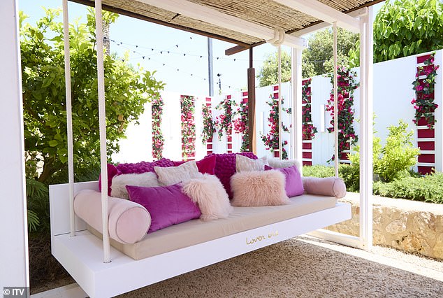 Inside the Hideaway is a swing covered in soft pink pillows, providing another intimate space for the cast to bond.