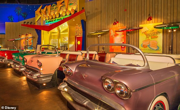 Diners can enjoy their meals at booths shaped like vintage cars and watch a movie on the giant screen.