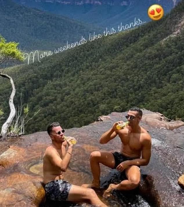 The photographs, taken late last year, show the couple smiling together while drinking beers next to a waterfall.