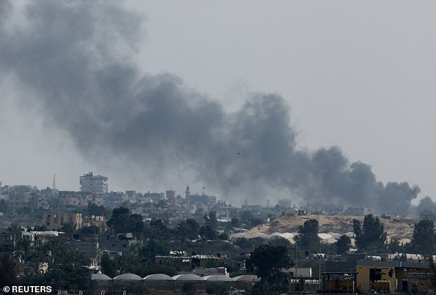 Smoke rises following Israeli attacks during an Israeli military operation in Rafah on May 28.