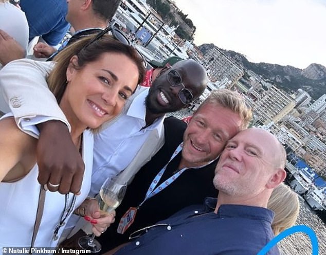 Natalie Pinkham (left) donned a vibrant white suit with wide-leg pants and a fitted vest.