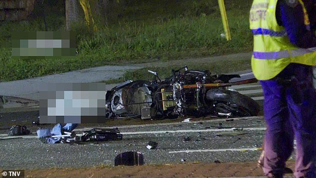 A motorcycle is seen at the scene of the collision in Greenacre, western Sydney.