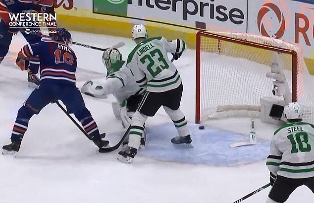 A shot from the right by Connor McDavid went off the post and wide of the net.