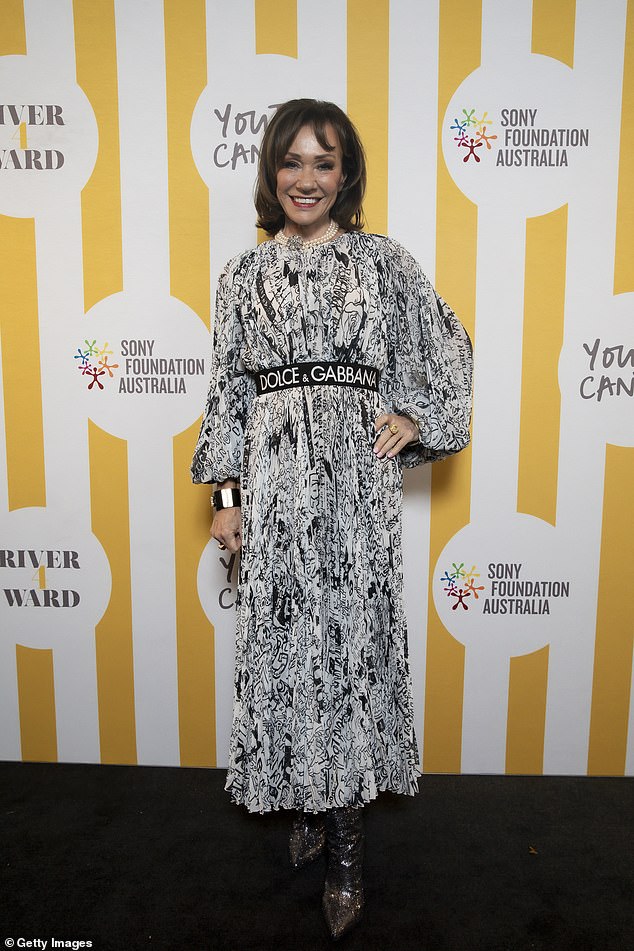 Ann Peacock looked glamorous in a long black and white dress which she paired with a Dolce and Gabbana belt.