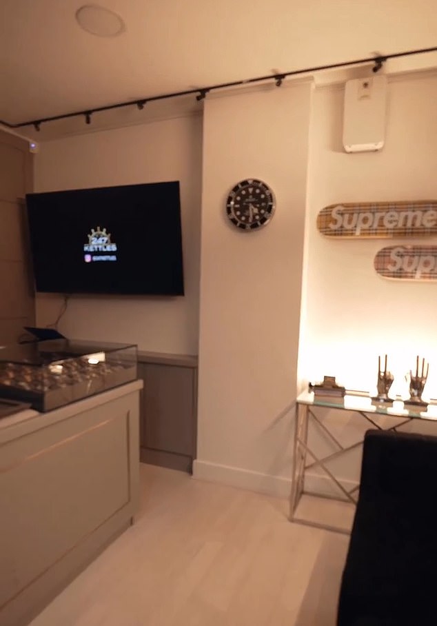 Here's another look at the showroom, which displays expensive brands like Supreme on its walls.