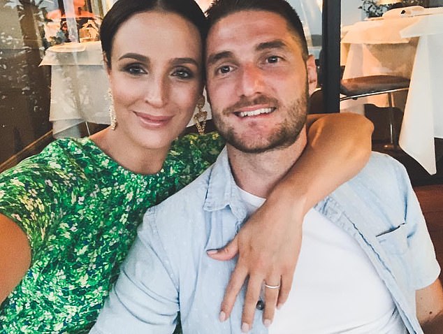 Zelic, 37, is married to former footballer Corey Gamiero (pictured together) and the couple have a daughter, Mila.