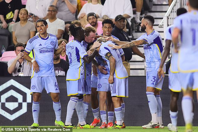 Atlanta United midfielder Saba Lobjanidze celebrates with teammates after scoring a goal against Inter Miami CF during the second half at Chase Stadium.