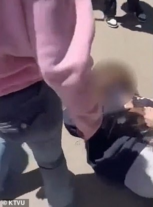 Three girls ganged up on her while others watched and screamed.