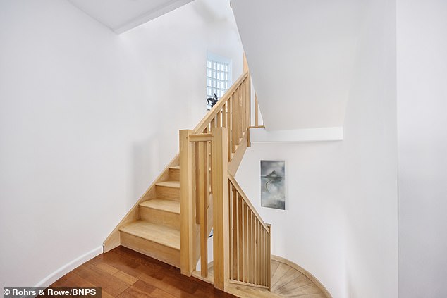 A wooden staircase inside the £1.45 million house