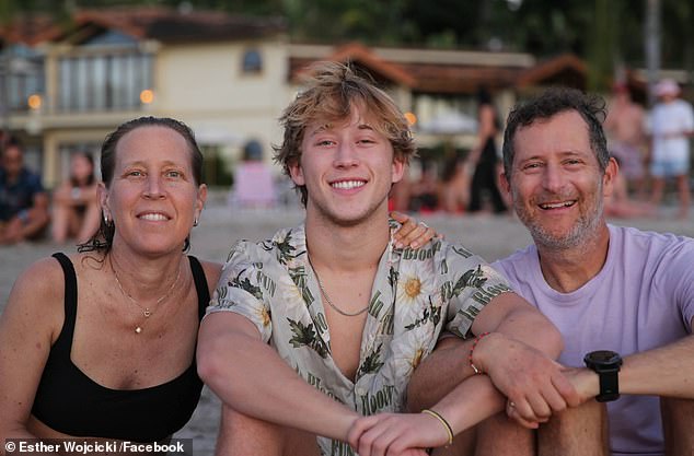 Troper, photographed with his parents Susan and Dennis, was described by his grandmother as a 