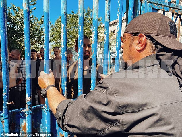 Seagal talks to Ukrainian prisoners through metal bars. Seagal openly supported Russia's 2014 annexation of Crimea