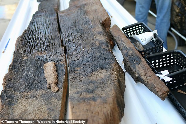 The Wisconsin Historical Society discovered the boats on Lake Mendota in the state's north, dating between 4,500 and 800 years old. In the photo there is a 3,000-year-old canoe.