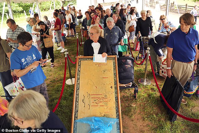 Ellie said the Antiques Roadshow team told them to never tell people where they lived, especially until the item they brought was out of the house. Pictured: Guests excited to receive an appraisal of their treasures.